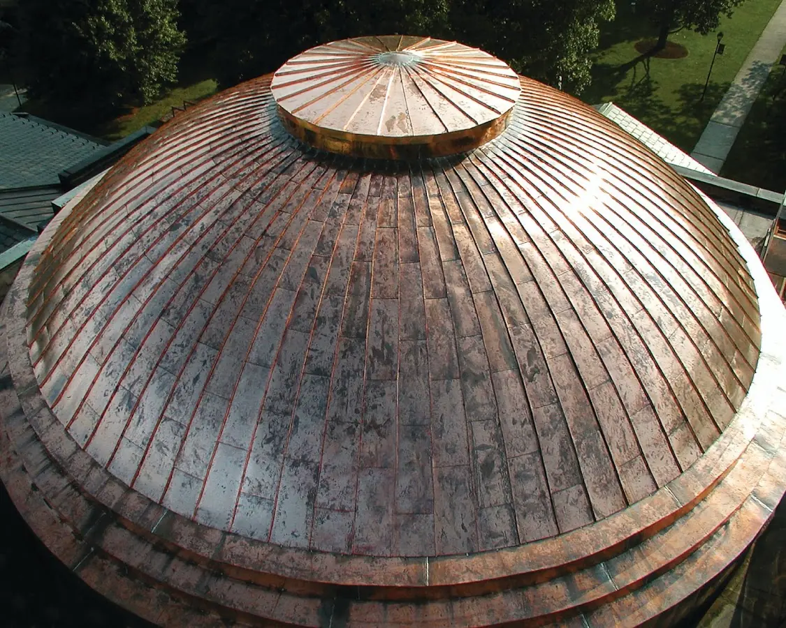 Craftsman Roofing crew installing a new roof in Tyngsboro